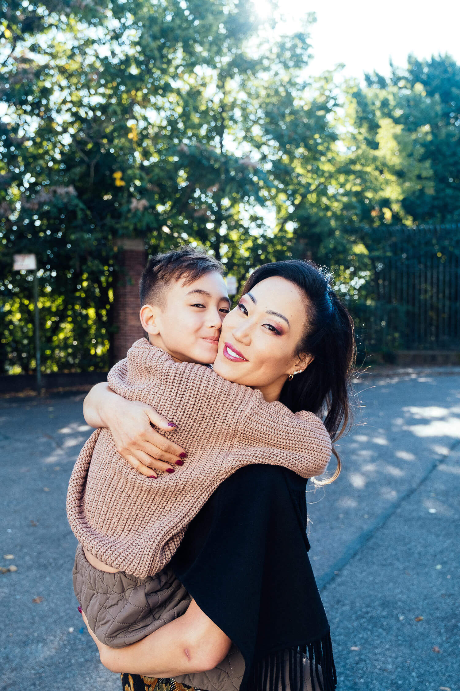 Mom holding her 7 years old boy