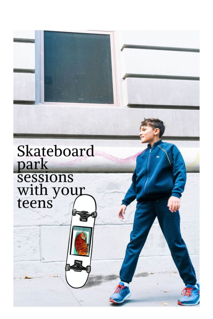 A young boy in a blue tracksuit and red sneakers smiles while holding a skateboard, captured in a vibrant photograph. Text on the image reads, Skateboard park sessions with your teens. The backdrop features a gray stone building, perfect for family session ideas.