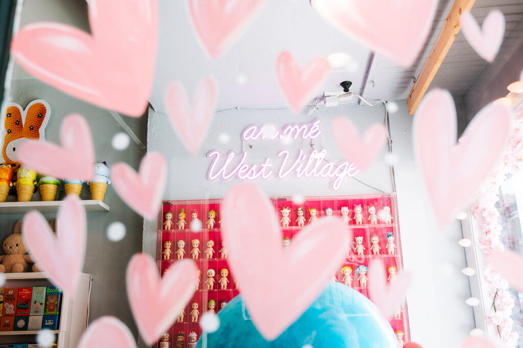 an.mé West Village location interior with neon sign pink hearts and Sonny Angel figurine display New York City